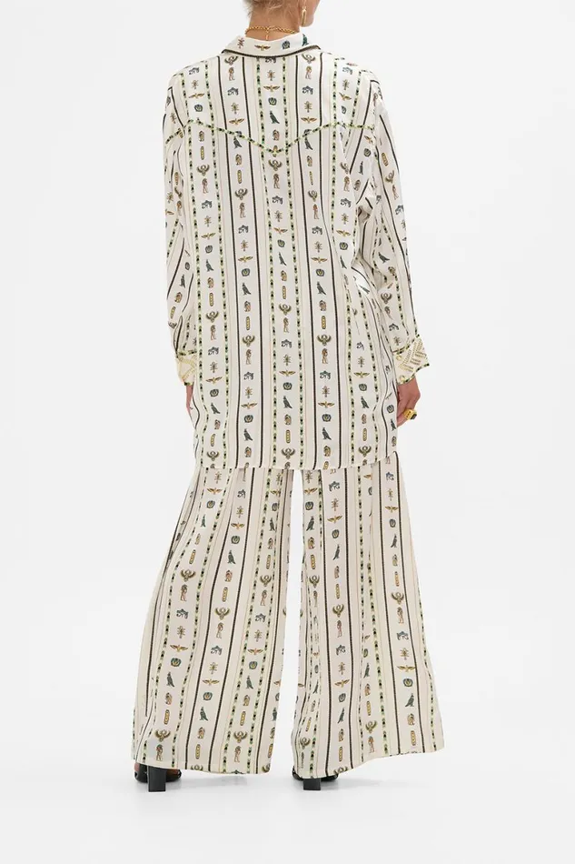 LONG LINE SHIRT WITH YOKE AND BUTTON DETAIL VALLEY OF THE QUEENS Valley Of The Queens Womens Camilla Long Sleeve Tops LONG LINE SHIRT WITH YOKE AND BUTTON DETAIL VALLEY OF THE QUEENS Valley Of The Queens Womens Camilla Long Sleeve Tops
